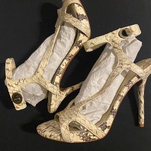100% Leather, animal print                          4” heel 1/2” platform